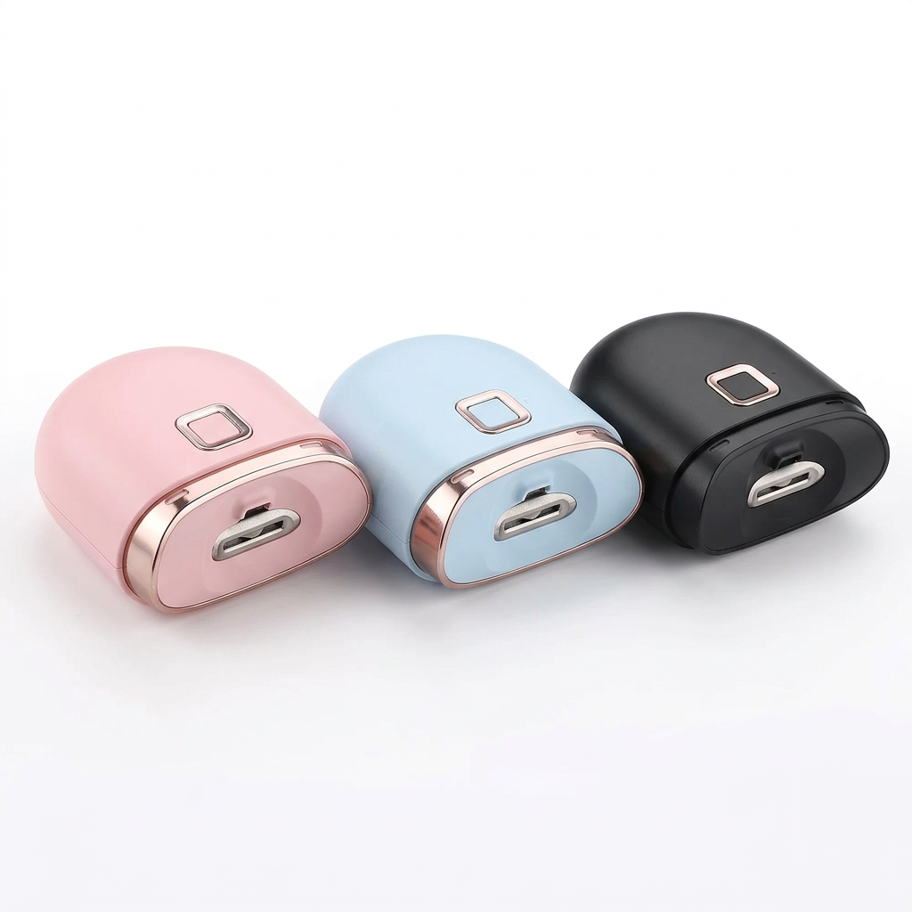 Coupe-ongles électrique en rose pastel, bleu clair et noir